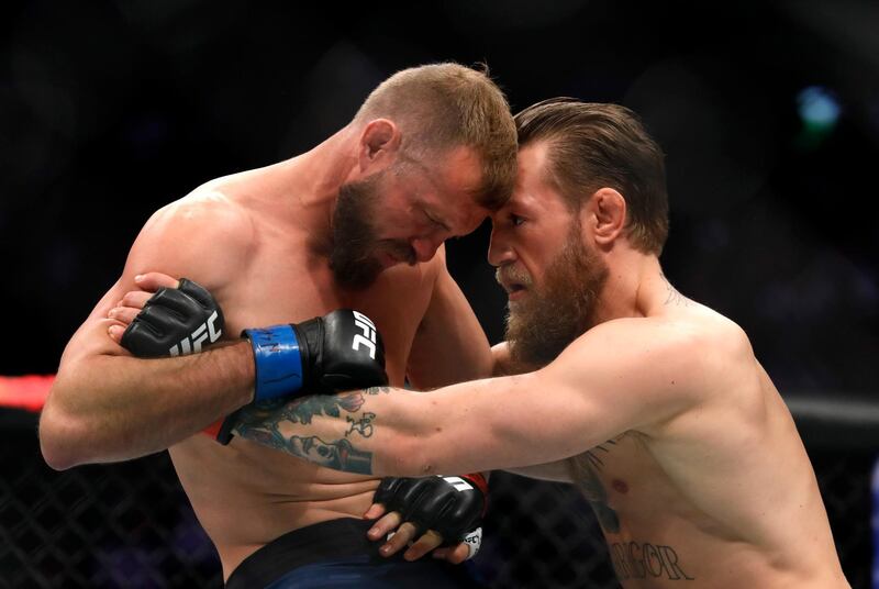 LAS VEGAS, NEVADA - JANUARY 18: Conor McGregor (R) fights Donald Cerrone in a welterweight bout during UFC246 at T-Mobile Arena on January 18, 2020 in Las Vegas, Nevada. McGregor won by first-round TKO.   Steve Marcus/Getty Images/AFP