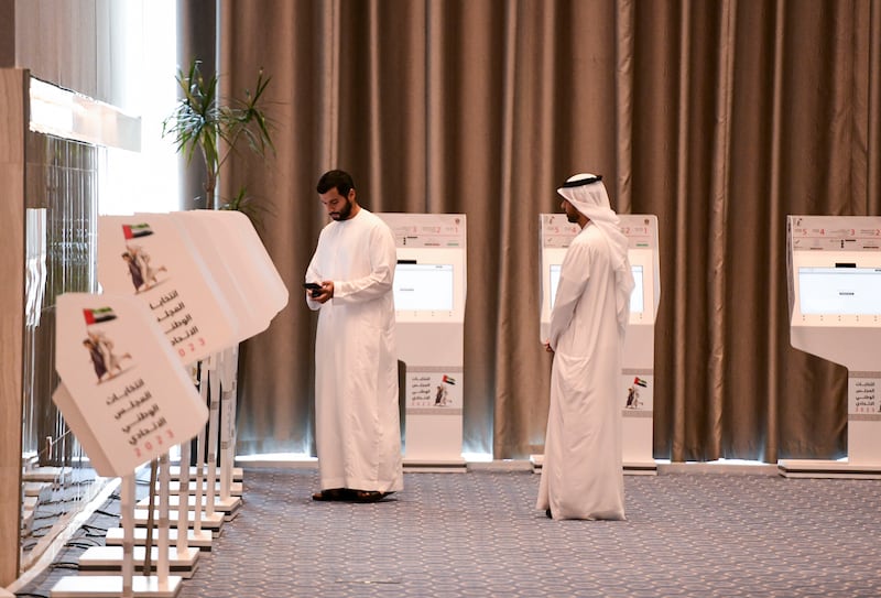 Early voters cast their ballots for the Federal National Council in Abu Dhabi. Khushnum Bhandari / The National 
