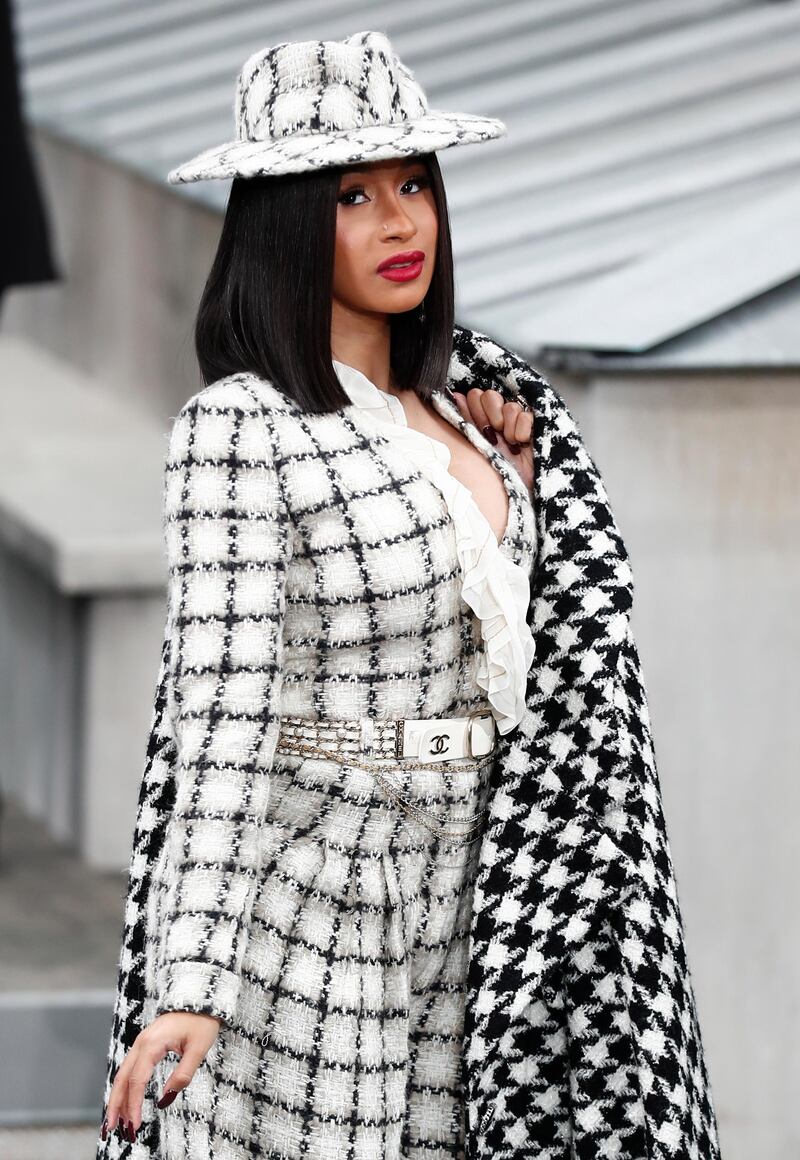 epa07884936 US rapper Cardi B attends the presentation of the Spring/Summer 2020 Women's collection by French designer Virginie Viard for Chanel fashion house during the Paris Fashion Week, in Paris, France, 01 October 2019. The presentation of the Women's collections runs from 23 September to 01 October.  EPA/IAN LANGSDON