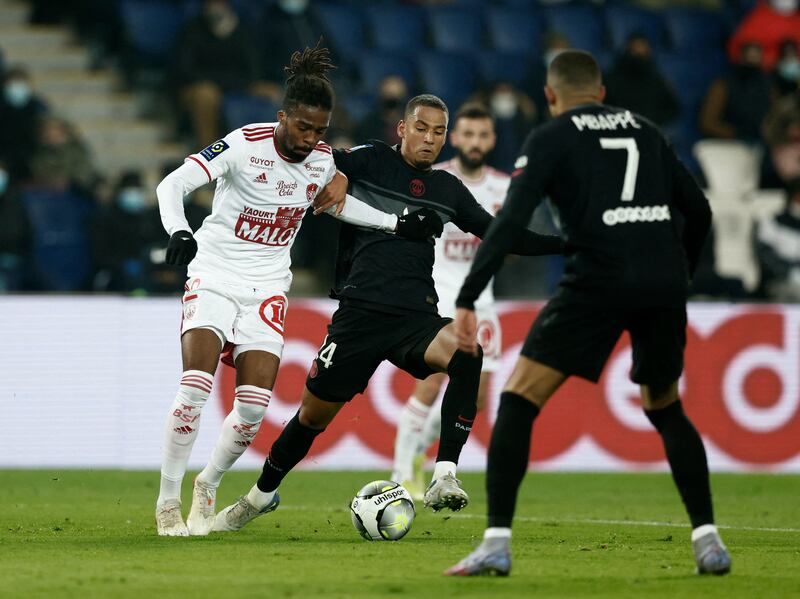 Paris St Germain's Thilo Kehrer in action with Brest's Jean-Kevin Duverne. Reuters