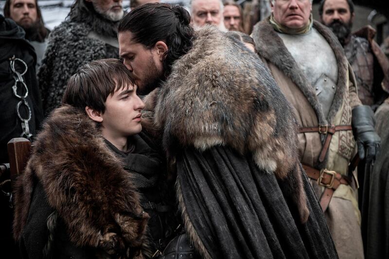 This image released by HBO shows  Isaac Hempstead Wright, left, and Kit Harington in a scene from "Game of Thrones," premiering on Sunday, April 14.  The first episode of the final season of "Game of Thrones" is a record-breaker for the series and HBO. The pay channel said the 17.4 million viewers who watched Sundayâ€™s episode either on TV or online represent a season-opening high for the fantasy saga. (Helen Sloan/HBO via AP)