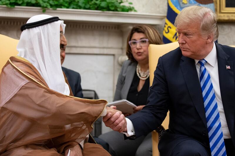 epa06999527 US President Donald J. Trump (R) shakes hands with the Emir of Kuwait Sheikh Sabah Al-Ahmad Al-Jaber Al-Sabah in the Oval Office of the White House, in Washington, DC, USA, 05 September 2018.  EPA/Alex Edelman / POOL