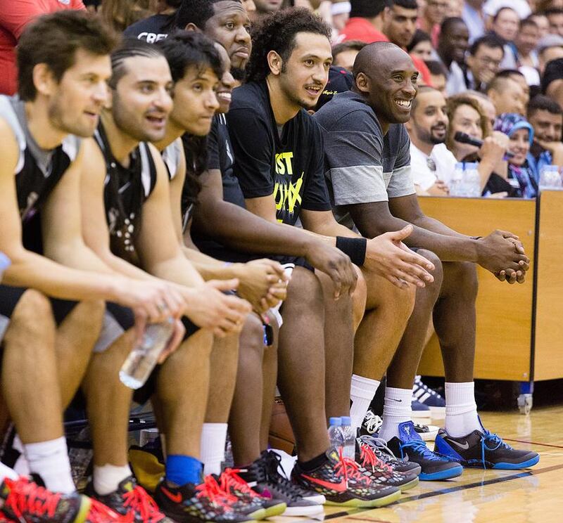 Kobe Bryant is all smiles as his team win at The American University in Dubai's Knights Arena. Duncan Chard for The National