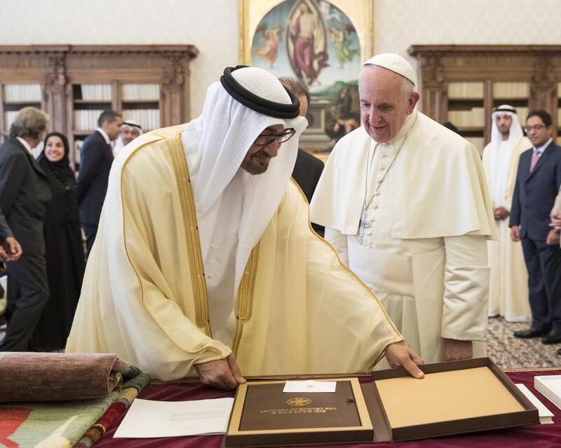 Sheikh Mohammed bin Zayed, Crown Prince of Abu Dhabi and Deputy Supreme Commander of the UAE Armed Forces, left,  exchange gifts with Pope Francis during his visit to the Vatican in September. Ryan Carter / Crown Prince Court — Abu Dhabi