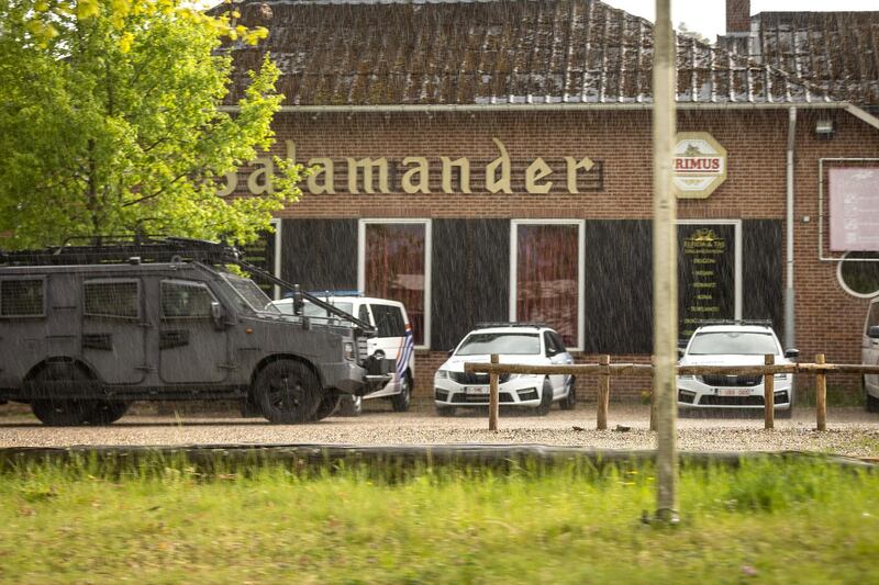 This photograph show special forces at Salamander, the main entrance of National Park Hoge Kempen in Dilsen-Stokkem, on May 19, 2021 as authorities are looking for a heavily armed professional soldier, Jurgen Conings, in the province of Limburg, since May 18, 2021. - The 46-year old man made threats against virologist Van Ranst who is brought to safety. (Photo by JAMES ARTHUR GEKIERE / Belga / AFP) / Belgium OUT