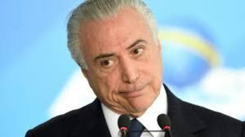 Mr Temer has been accused of receiving $12m (£9m) in bribes. AFP