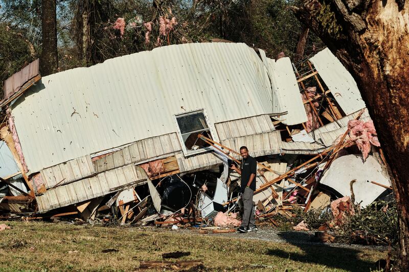 A damaged trailer home in Mount Vernon. Officials said there were six deaths across the state. EPA