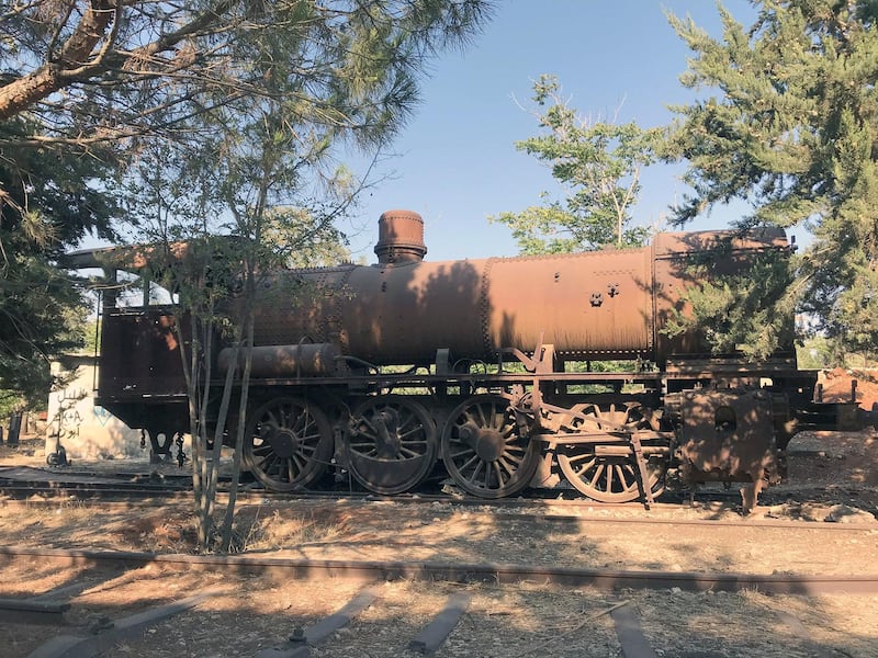 An old steam engine rusting in Riyaq. Photo by Tom Young