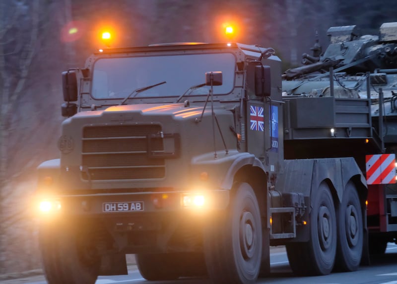 A convoy of British armoured vehicles of the Royal Welsh Battlegroup on the way to Estonia, driving through Liepupe, Latvia, on February 25.  British troops and equipment are heading to Estonia as part of the UK's contribution to strengthen Nato's uplift to Eastern Europe. EPA