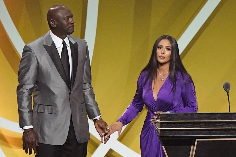 Presenter Michael Jordan holds the hand of Kobe Bryant's widow, Vanessa Bryant. Kobe was among the 2020 NBA Hall of Fame class in Uncasville, Connecticut. AP