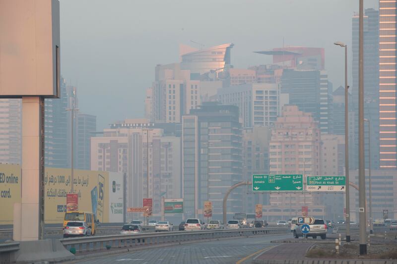 Fog covers the city's iconic buildings. Antonie Robertson / The National