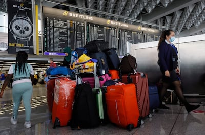 Luggage has been piling high at airports around the world, including this trolley in Frankfurt's airport, Germany. EPA