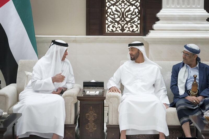 ABU DHABI, UNITED ARAB EMIRATES - June 05, 2018: HH Sheikh Mohamed bin Zayed Al Nahyan Crown Prince of Abu Dhabi Deputy Supreme Commander of the UAE Armed Forces (C), speaks with HH Sheikh Saud bin Saqr Al Qasimi, UAE Supreme Council Member and Ruler of Ras Al Khaimah (L), during an iftar reception at Al Bateen Palace. Seen with HE Ahmed Al Misri, Deputy Prime Minister and Minister of Interior of Yemen (R).

( Mohamed Al Hammadi / Crown Prince Court - Abu Dhabi )
---