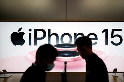 An Apple iPhone 15 advertisement is seen as it officially went on sale across China at an Apple Store in Shanghai. Reuters
