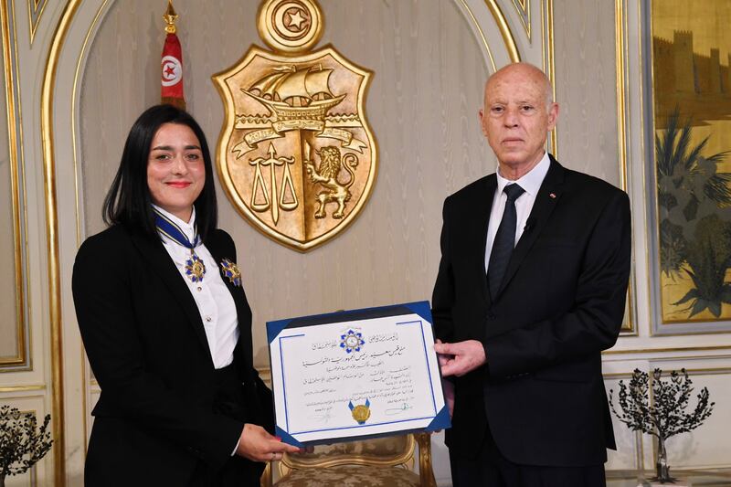 Tunisian President Kais Saied presents Tunisian tennis player Ons Jabeur with the Order of Sports Merit during an official ceremony in Tunis, Tunisia. EPA