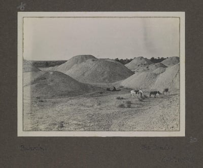 The view in 1918 of some of the Dilmun Burial Mounds, on Bahrain, once the heart of the Bronze Age Dilmun trading empire. British Library