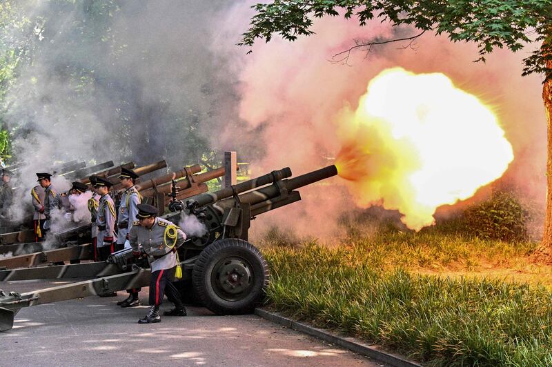 Cannon fire a twenty-one gun salute at the National Cemetery in Seoul as South Korea marks Memorial Day on Tuesday. AFP
