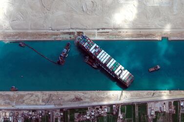 This satellite image from Maxar Technologies shows the cargo ship MV Ever Given stuck in the Suez Canal near Suez, Egypt, Sunday, March 28, 2021. AP