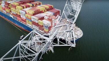 Part of the steel frame of the Francis Scott Key Bridge on top of the container ship, Dali, after it collapsed in Baltimore, Maryland. AFP