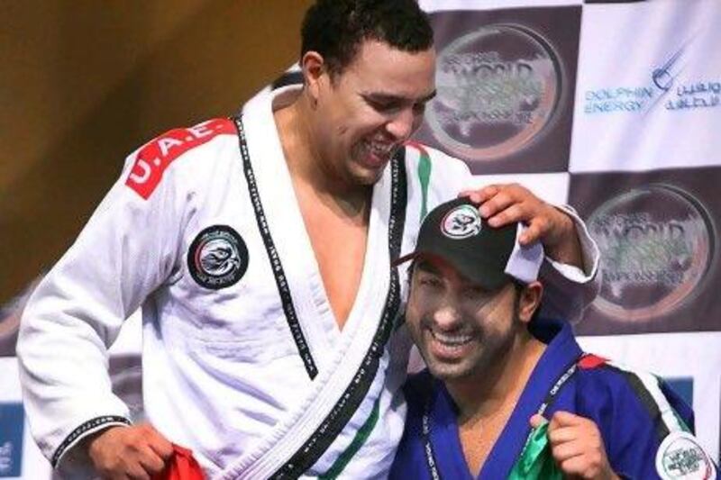 Faisal Al Ketbi, left, took home a pair of gold medals and Yahia Al Hamadi a bronze in the finals on Saturday night, as they were among the many winners at the World Professional Jiu-Jitsu Championship in Abu Dhabi.