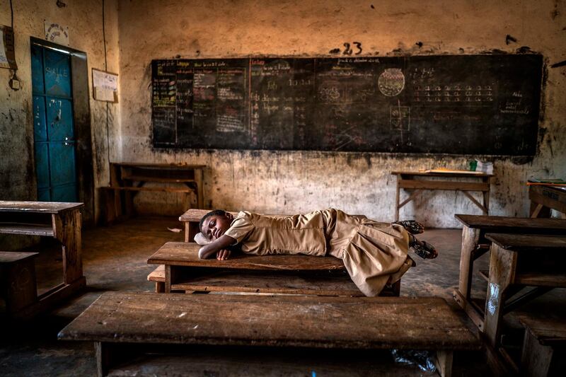 Aragon Renuncio Antonio - Sweet Dreams (School near Burkina Faso border)
A girl sleeps on a desk inside her schoolroom. Extreme rains have tripled in the Sahel in the last 35 years due to global warming. Climate change has caused 70 episodes of torrential rains in the last decade although the region suffers severe episodes of drought.