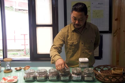 Rajat Thapa, manager of the Happy Valley Tea Estate, Darjeeling’s second oldest tea plantation, showing the types of teas produced at the estate. Taniya Dutta / The National