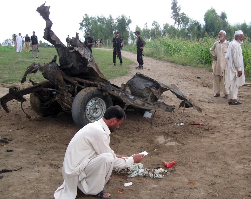 Pakistani security officials at the site of a bomb blast in Jandol town, 100km from the once Taliban-infested Swat Valley on September 16, 2012. AFP