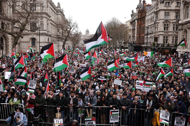 Protestors gather near parliament in London. Getty Images