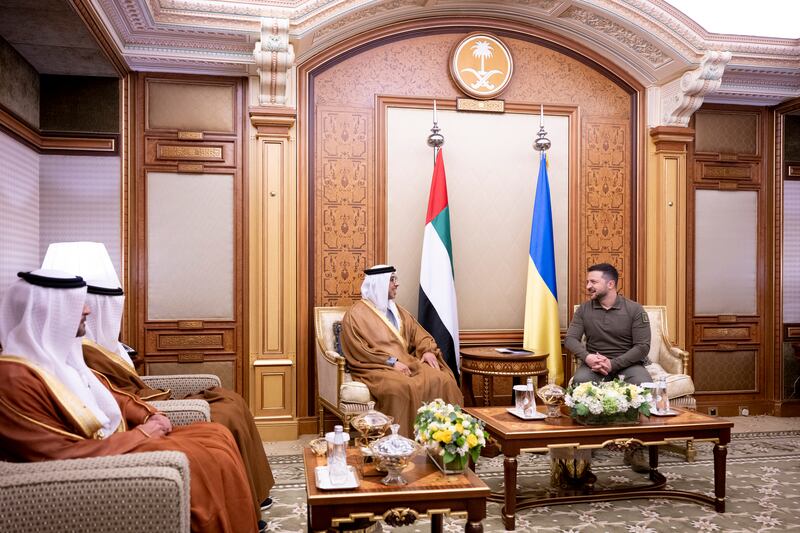 Sheikh Mansour bin Zayed, Vice President, Deputy Prime Minister and Minister of the Presidential Court, speaks with Mr Zelenskyy during the summit