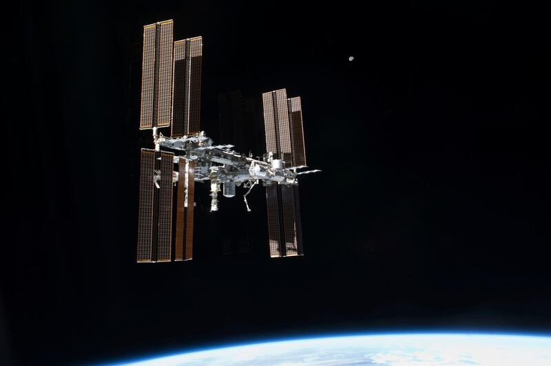 FILE - This July 19, 2011 photo of the International Space Station was taken from the space shuttleÂ Atlantis. On Tuesday, Sept. 29, 2020, NASA said that the two Russians and one American on board were awakened late Monday to hurriedly seal hatches between compartments and search for the ongoing leak, which appeared to be getting worse. It was the third time in just over a month that the crew had to isolate themselves on the Russian side, in an attempt to find the growing leak.  (NASA via AP)