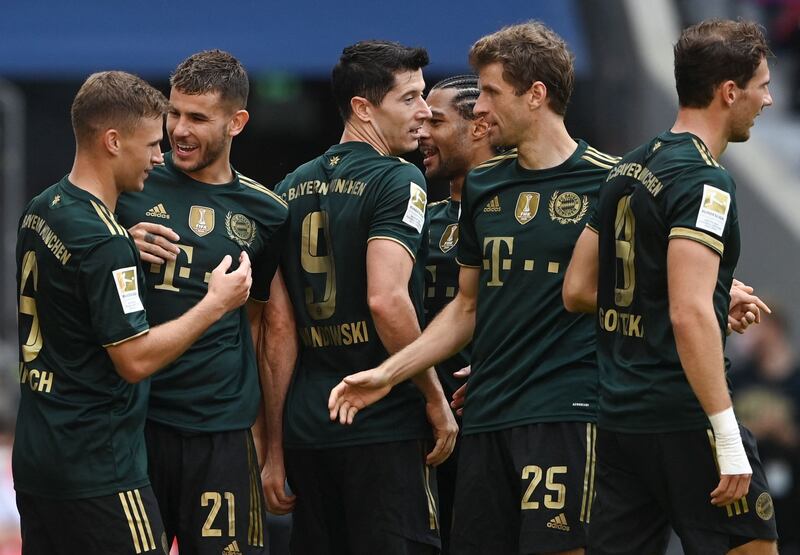 Bayern Munich's Joshua Kimmich, Lucas Hernandez, Robert Lewandowski, Serge Gnabry, Thomas Muller and Leon Goretzka celebrate the sixth goal. AFP