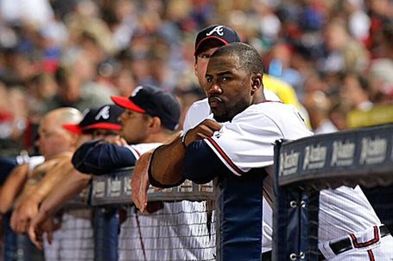 Jason Heyward follows the action from the Braves' dugout at Turner Field in Atlanta.