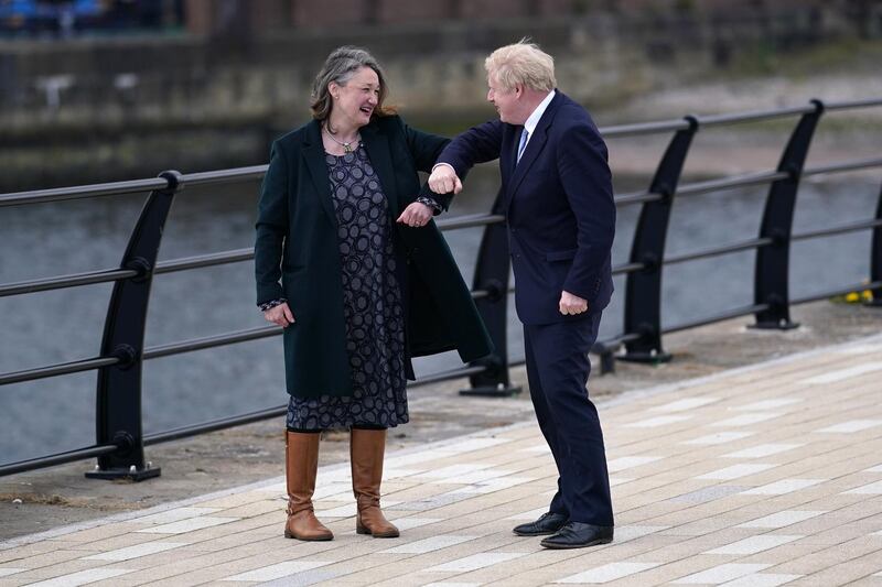 Boris Johnson elbow bumps Jill Mortimer at the National Museum of the Royal Navy, in Hartlepool Marina. Getty Images