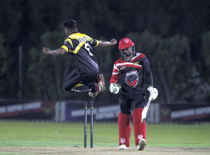 Ajman, United Arab Emirates - Reporter: Paul Radley. Sport. Cricket. Panther's Ronak Panoly is bowled by Tiger's Harikrishnan Valloli during the game between Panthers vs Tigers in the Karwan Rising Stars F40 Final. Thursday, February 11th, 2021. Ajman. Chris Whiteoak / The National
