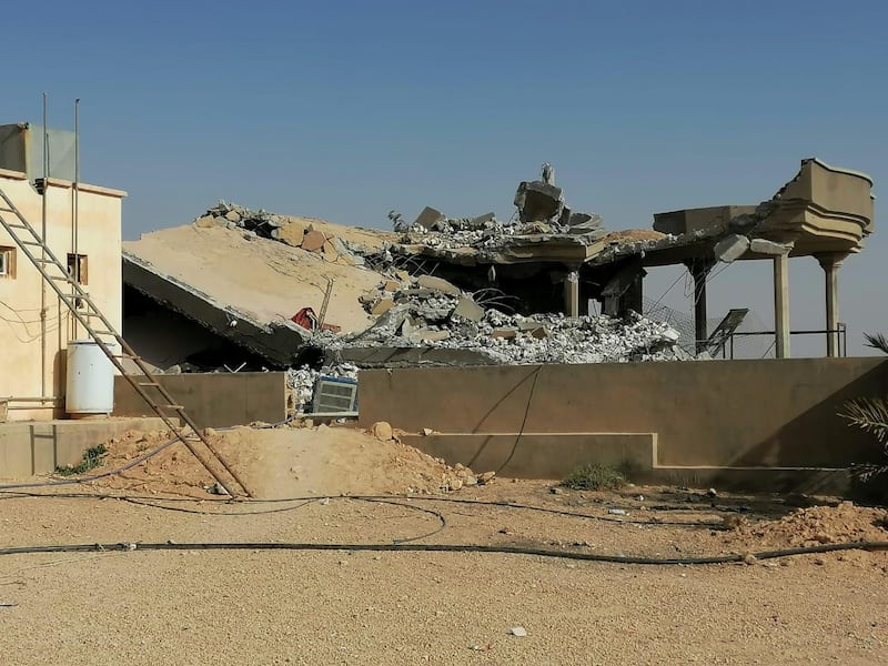 The destroyed headquarters of Kataib Hezbollah in Qaim. Reuters