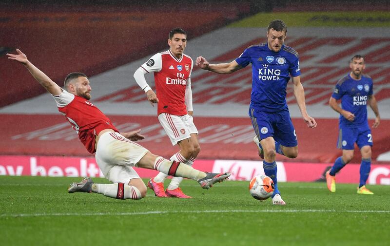 Leicester's Jamie Vardy, second right, scores his team's first goal during the Premier League match at Arsenal. AP Photo