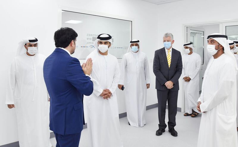 Sheikh Mansour Bin Mohammed Al Maktoum and Sheikh Ahmed Bin Saeed Al Maktoum at the new lab for processing Covid-19 PCR tests at Dubai International Airport. Courtesy: DXB.