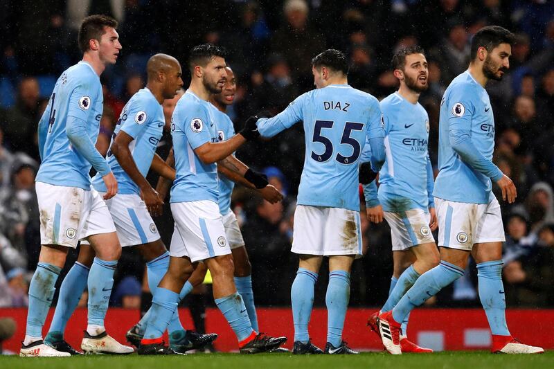 Soccer Football - Premier League - Manchester City vs West Bromwich Albion - Etihad Stadium, Manchester, Britain - January 31, 2018   Manchester City's Sergio Aguero celebrates with team mates after scoring their third goal    Action Images via Reuters/Jason Cairnduff    EDITORIAL USE ONLY. No use with unauthorized audio, video, data, fixture lists, club/league logos or "live" services. Online in-match use limited to 75 images, no video emulation. No use in betting, games or single club/league/player publications.  Please contact your account representative for further details.