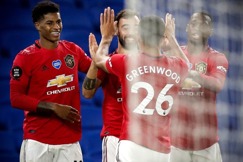 Manchester United's Bruno Fernandes (C) celebrates with his teammates after scoring the third. EPA