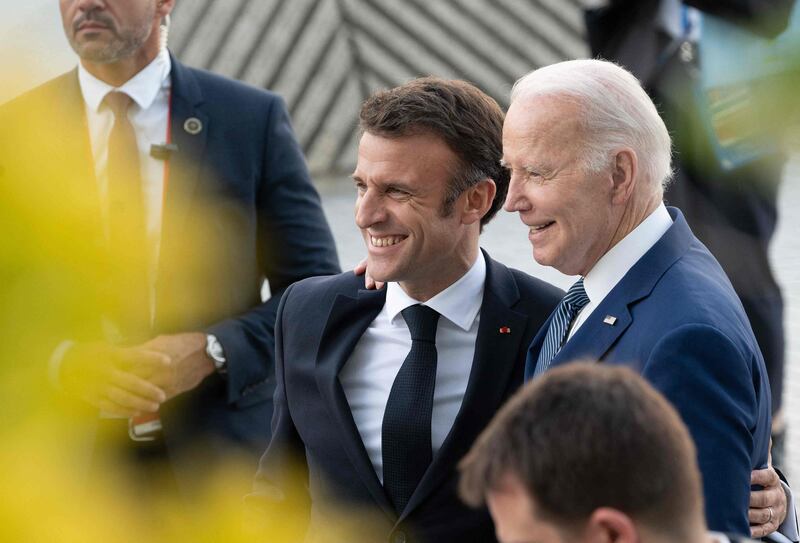 France's President Emmanuel Macron, left, and US President Joe Biden at the G7 Leaders' Summit in Hiroshima, Japan, where pledges for climate action have been renewed. AFP