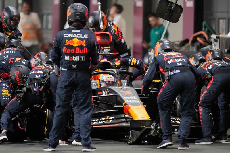 Max Verstappen makes a pit stop. AFP