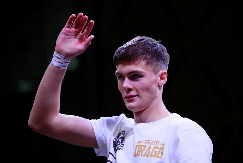 British flyweight Ivan Price waves during the public work out. Reuters