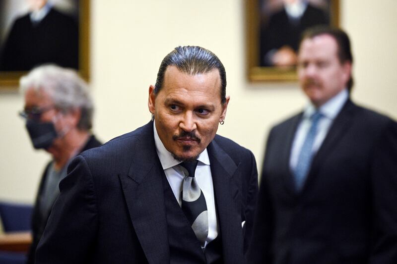 Depp returns to the courtroom after a break. Reuters