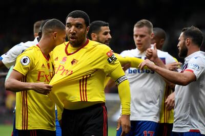 Soccer Football - Premier League - Watford vs Stoke City - Vicarage Road, Watford, Britain - October 28, 2017   Watford's Troy Deeney is pulled away by Richarlison    Action Images via Reuters/Tony O'Brien    EDITORIAL USE ONLY. No use with unauthorized audio, video, data, fixture lists, club/league logos or "live" services. Online in-match use limited to 75 images, no video emulation. No use in betting, games or single club/league/player publications. Please contact your account representative for further details.?