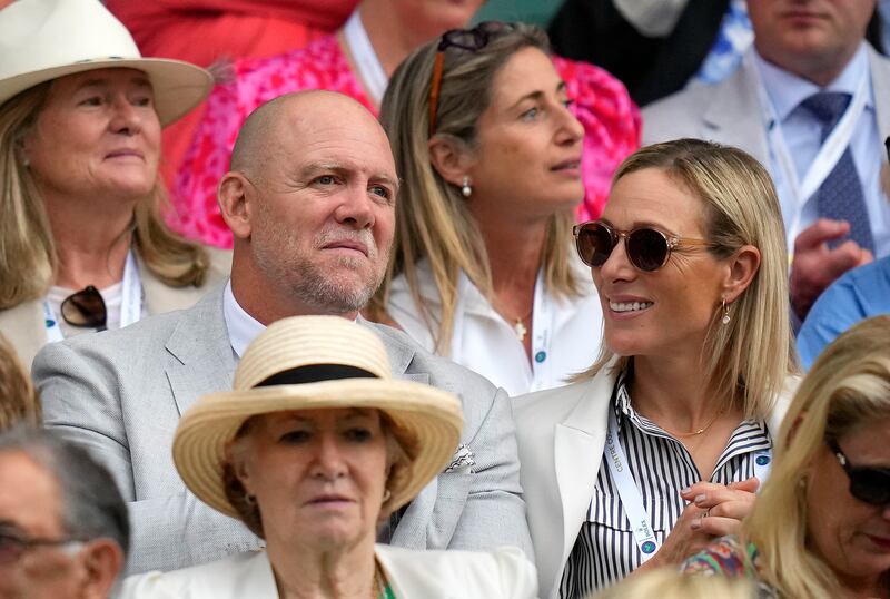 Zara Tindall and her husband Mike Tindall watch Tunisia's Ons Jabeur. AP 