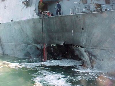 Damage sustained by the USS Cole after a suicide boat attack in October 2000 which killed 17 sailors. Getty Images