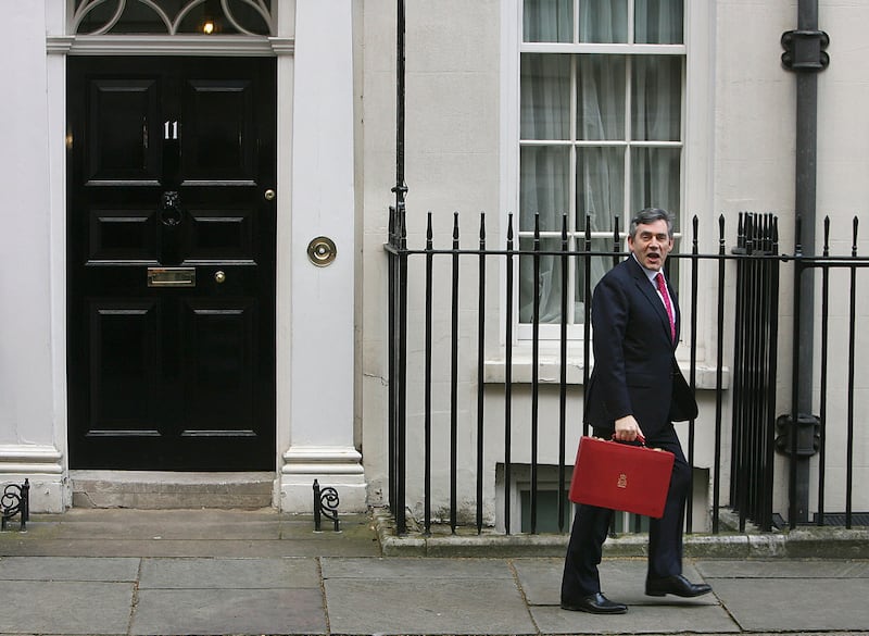 Gordon Brown leaves for Parliament to present his 11th Budget statement in 2007, his last before becoming prime minister