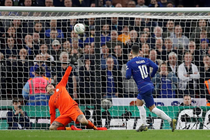 Chelsea's Eden Hazard scores from the penalty spot during the shootout. Action Images via Reuters