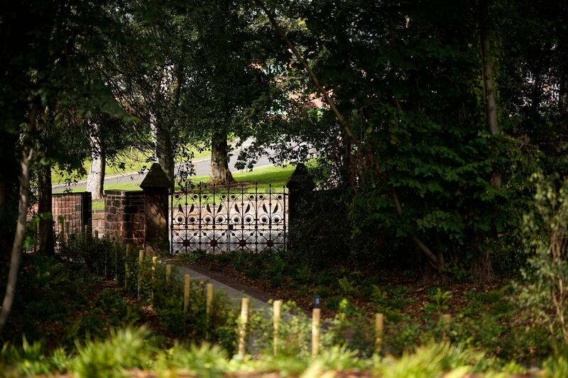 The original entrance and replica gates to Strawberry Field.