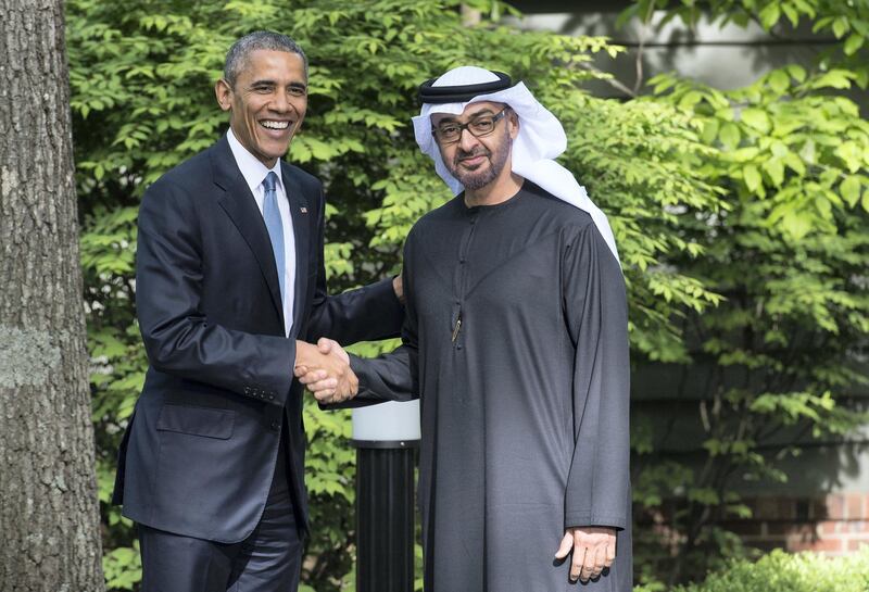 US President Barack Obama greets Abu Dhabi Crown Prince and commander of the United Arab Emirates armed forces Mohammed bin Zayed al-Nahyan during a summit meeting with Gulf Cooperation Council (GCC) leaders at Camp David in Maryland on May 14, 2015.     AFP PHOTO/NICHOLAS KAMM (Photo by NICHOLAS KAMM / AFP)